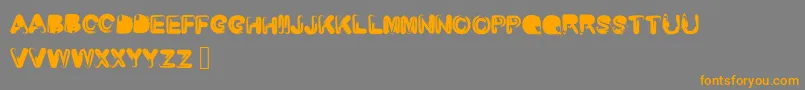 Roundedbrush-Schriftart – Orangefarbene Schriften auf grauem Hintergrund