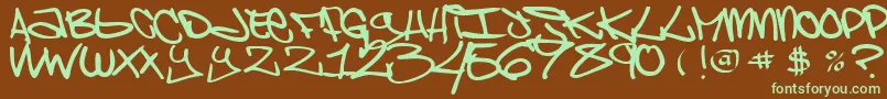 Czcionka ChaoskidsBrooklynKid – zielone czcionki na brązowym tle