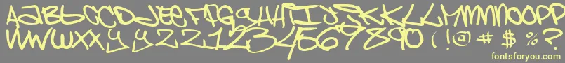Czcionka ChaoskidsBrooklynKid – żółte czcionki na szarym tle
