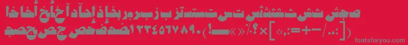 AymShatySUNorm-Schriftart – Graue Schriften auf rotem Hintergrund
