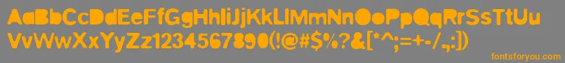 フォントBlitz – オレンジの文字は灰色の背景にあります。