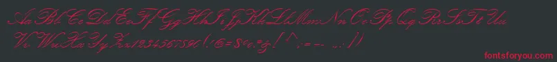 フォントKunstlerScript – 黒い背景に赤い文字