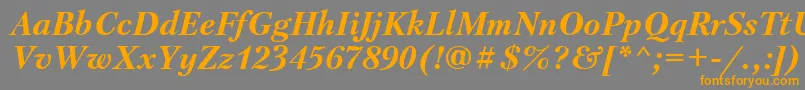 フォントPetersburgBolditalicCyrillic – オレンジの文字は灰色の背景にあります。