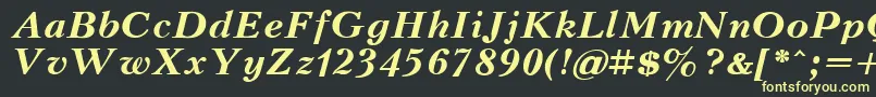 フォントKudrashovBoldItalic.001.001 – 黒い背景に黄色の文字