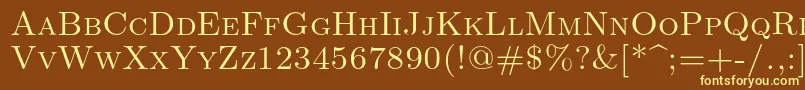 Lmromancaps10Regular-fontti – keltaiset fontit ruskealla taustalla