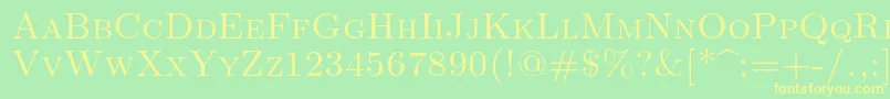 Lmromancaps10Regular-Schriftart – Gelbe Schriften auf grünem Hintergrund