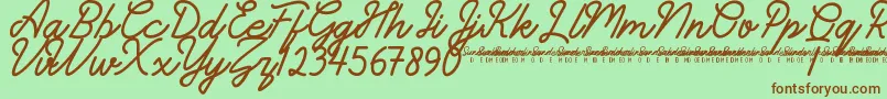 フォントSunderlinesDemo – 緑の背景に茶色のフォント