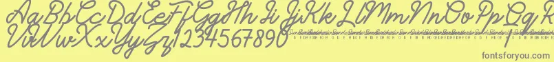 Czcionka SunderlinesDemo – szare czcionki na żółtym tle
