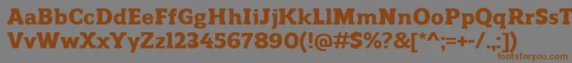 ReganslabHeavy-Schriftart – Braune Schriften auf grauem Hintergrund