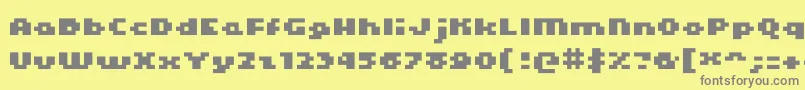 フォントKroeger0465 – 黄色の背景に灰色の文字