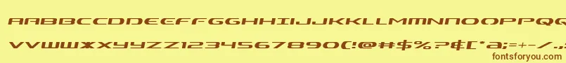 フォントAlphamensemital – 茶色の文字が黄色の背景にあります。