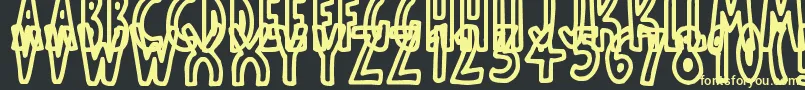 ThinToonOutlines Font – Yellow Fonts on Black Background