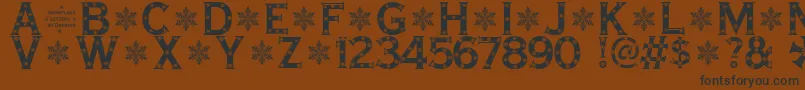 SnowflakeLetters Font – Black Fonts on Brown Background