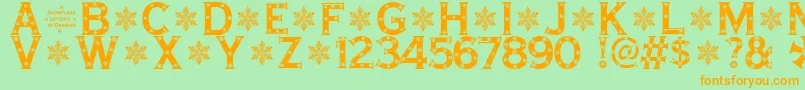 SnowflakeLetters Font – Orange Fonts on Green Background