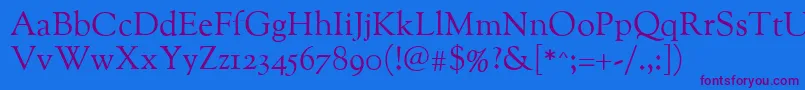 Oflgoudystmtt Font – Purple Fonts on Blue Background