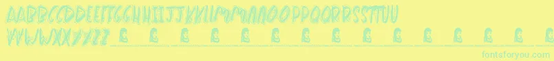 フォントWakeMeUp – 黄色い背景に緑の文字