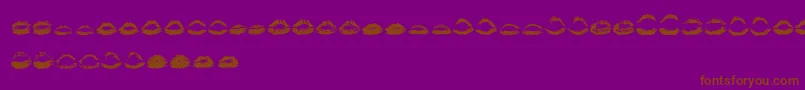 フォントKissKissOtf – 紫色の背景に茶色のフォント