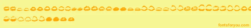 Fonte KissKissOtf – fontes laranjas em um fundo amarelo