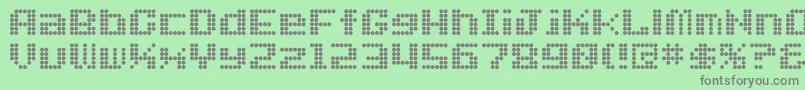 Dotfont Font – Gray Fonts on Green Background