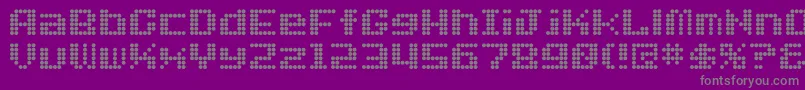 Dotfont-fontti – harmaat kirjasimet violetilla taustalla