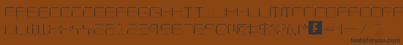 AmayaTechnicalDots-Schriftart – Schwarze Schriften auf braunem Hintergrund