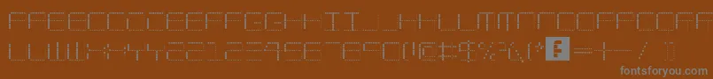 AmayaTechnicalDots-Schriftart – Graue Schriften auf braunem Hintergrund