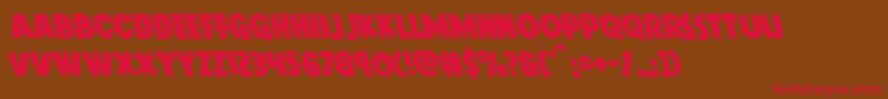 Doktermonstroleft-Schriftart – Rote Schriften auf braunem Hintergrund