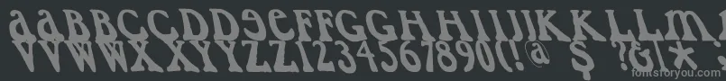 フォントCaslondadaesqueleft – 黒い背景に灰色の文字