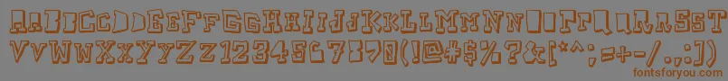 フォントTaketwo – 茶色の文字が灰色の背景にあります。