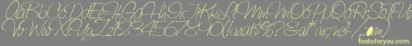 SaginawLight-Schriftart – Gelbe Schriften auf grauem Hintergrund