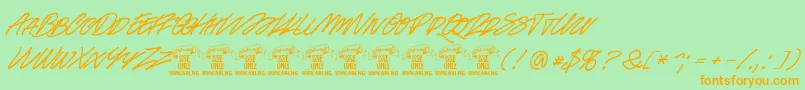 Racefeverpenpersonal-Schriftart – Orangefarbene Schriften auf grünem Hintergrund