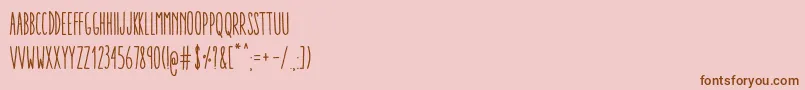 Fonte AracneUltraCondensedRegular – fontes marrons em um fundo rosa