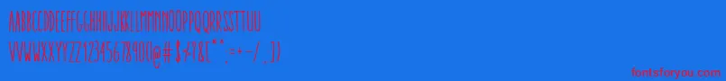 フォントAracneUltraCondensedRegular – 赤い文字の青い背景