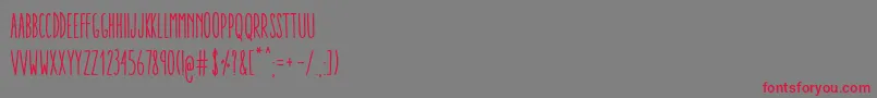 フォントAracneUltraCondensedRegular – 赤い文字の灰色の背景