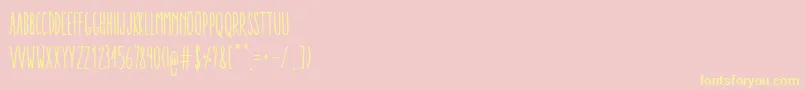 フォントAracneUltraCondensedRegular – 黄色のフォント、ピンクの背景