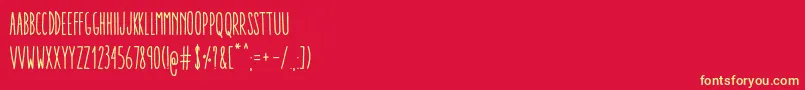 Czcionka AracneUltraCondensedRegular – żółte czcionki na czerwonym tle