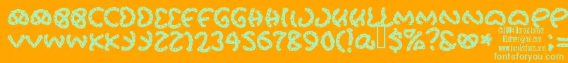 Prets Font – Green Fonts on Orange Background