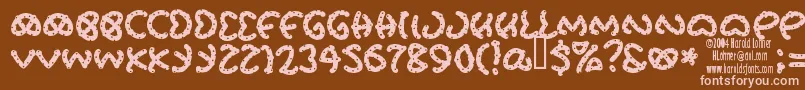 Prets Font – Pink Fonts on Brown Background