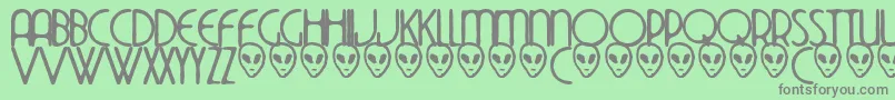 Thedekoside Font – Gray Fonts on Green Background