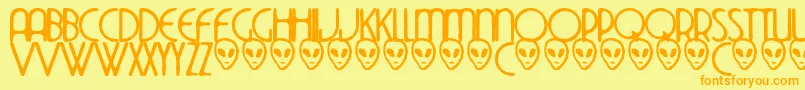 フォントThedekoside – オレンジの文字が黄色の背景にあります。