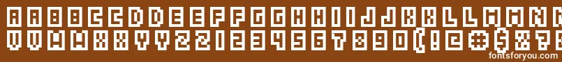 GrixelAcme5CompcapsoXtnd-fontti – valkoiset fontit ruskealla taustalla