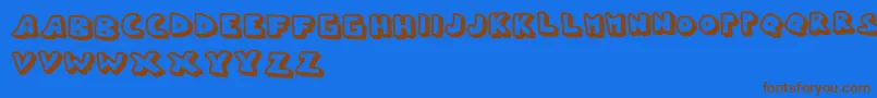 フォントWhypo – 茶色の文字が青い背景にあります。