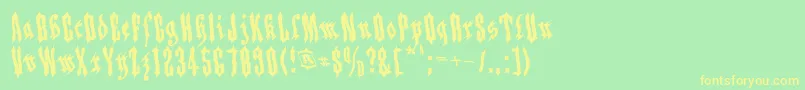 フォントApplesauce04 – 黄色の文字が緑の背景にあります