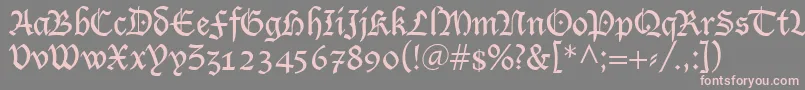 フォントLutherRegular – 灰色の背景にピンクのフォント