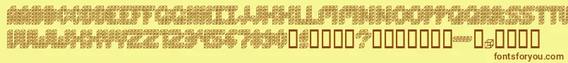 Шрифт CubeToss – коричневые шрифты на жёлтом фоне