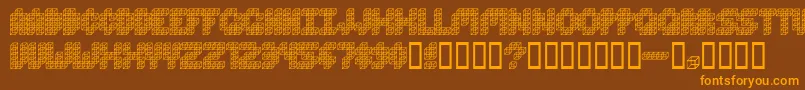 CubeToss-Schriftart – Orangefarbene Schriften auf braunem Hintergrund