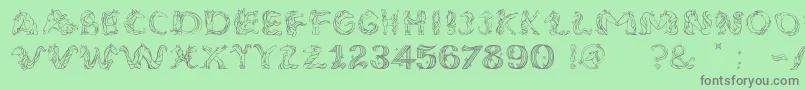 フォントUnicornSansLight – 緑の背景に灰色の文字