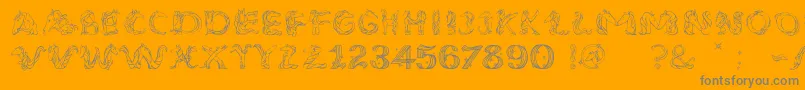 UnicornSansLight-Schriftart – Graue Schriften auf orangefarbenem Hintergrund