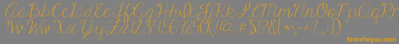 Kgonlyhuman-Schriftart – Orangefarbene Schriften auf grauem Hintergrund