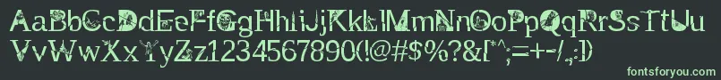 TakEnchanted Font – Green Fonts on Black Background